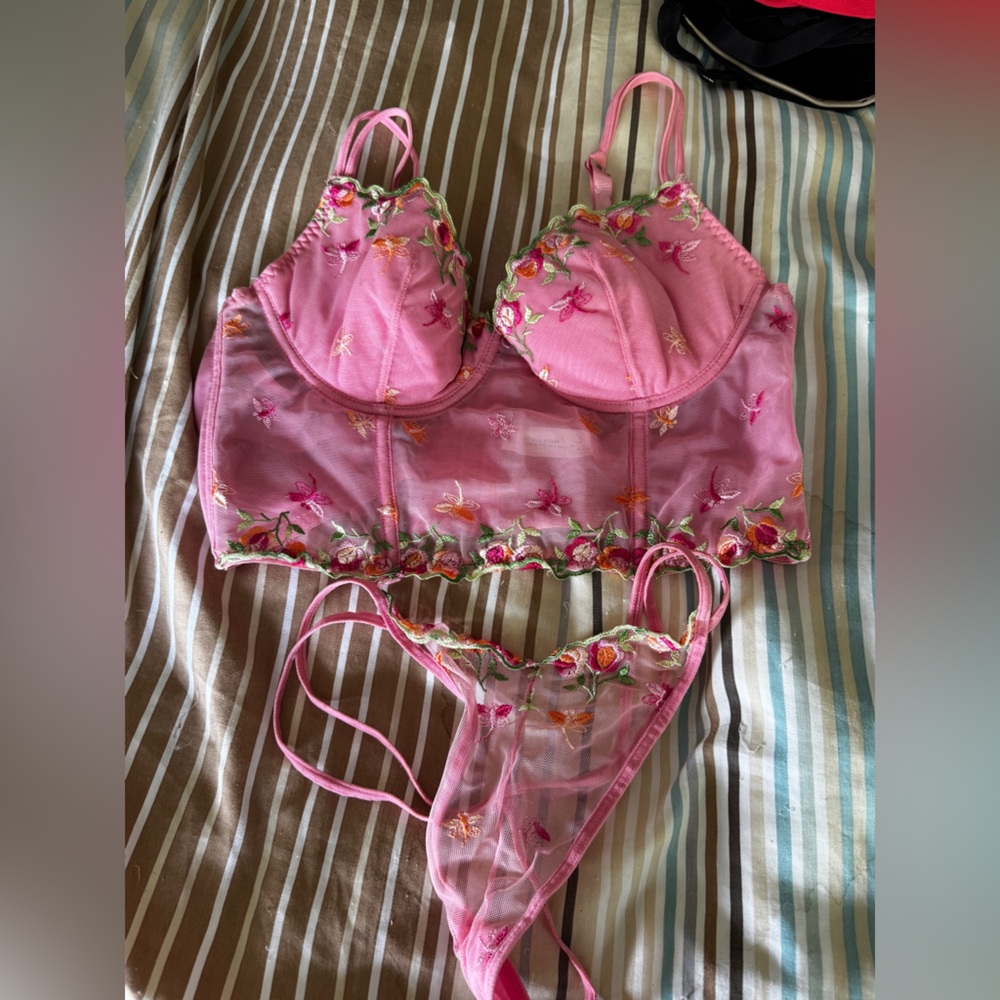 Vintage pink bustier and tong.